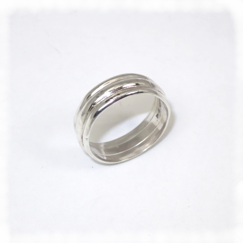 Silver ring formed from three wire sections